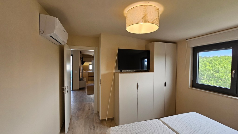 Bedroom with a view of the greenery