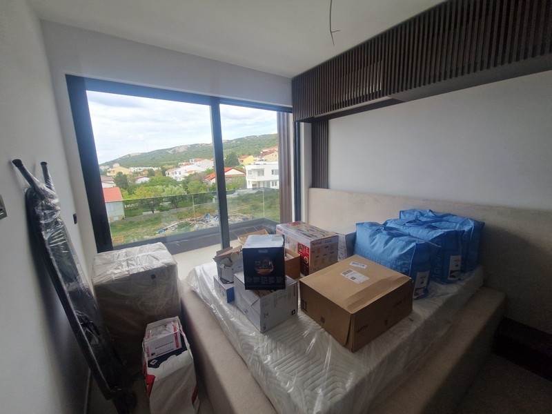 Entrance area with custom-made built-in furniture