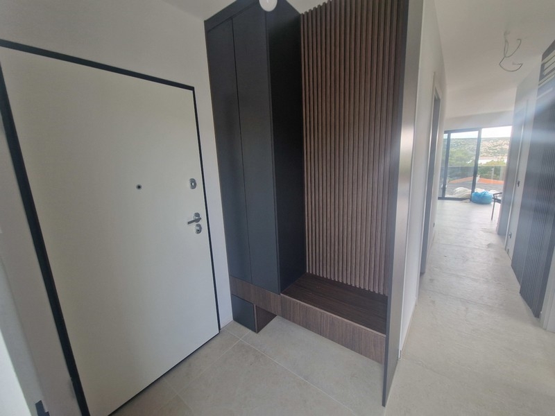 Hallway with wooden slats and modern design