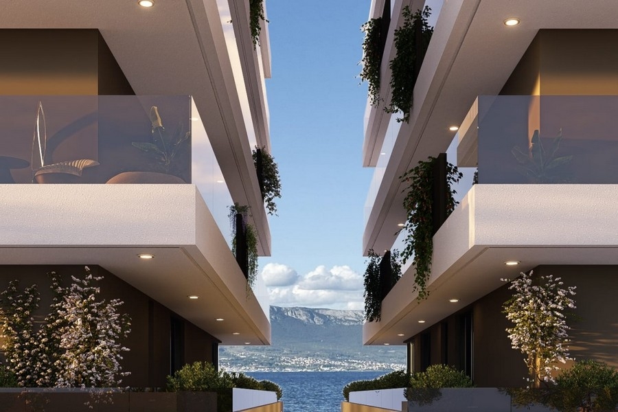 View of the sea between the buildings.