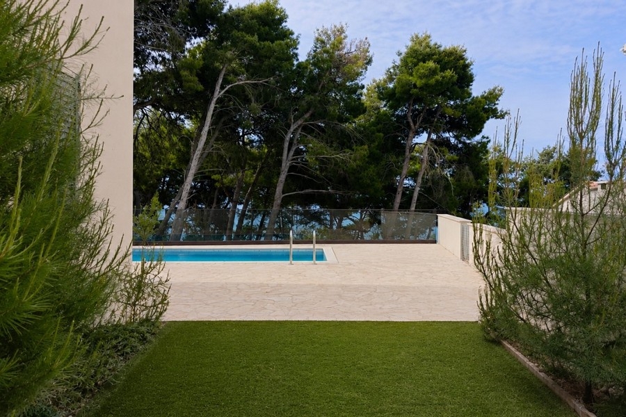 Garden area with swimming pool and Mediterranean plants