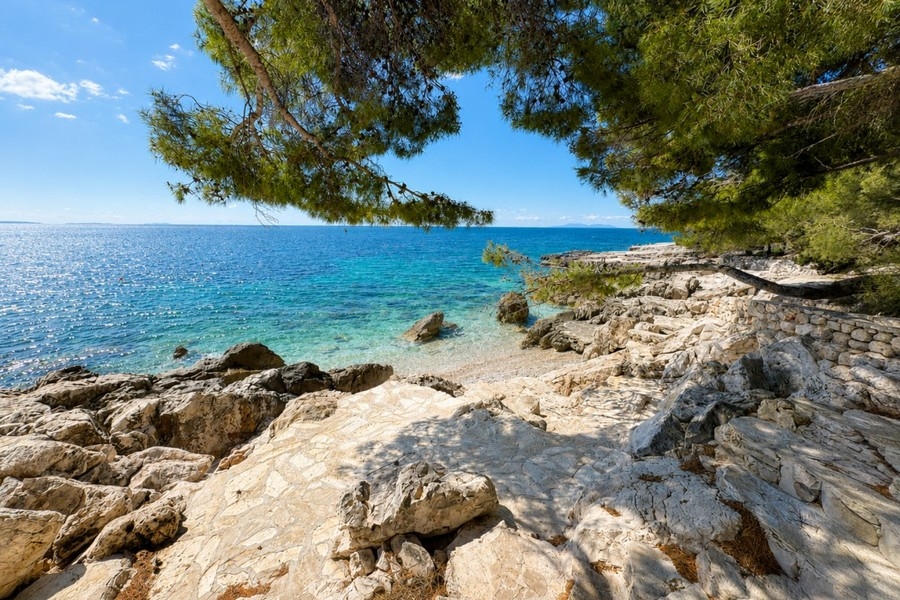 Rocky coastline with crystal clear sea in Croatia