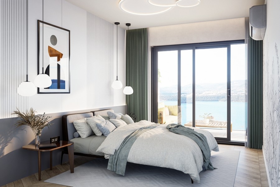 Bedroom with sea view and glass front