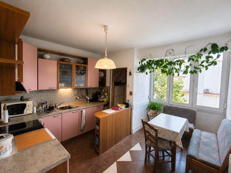 Kitchen with seating and natural light