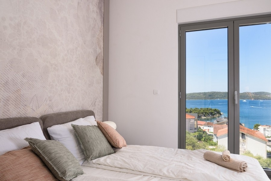 Bright bedroom with panoramic windows