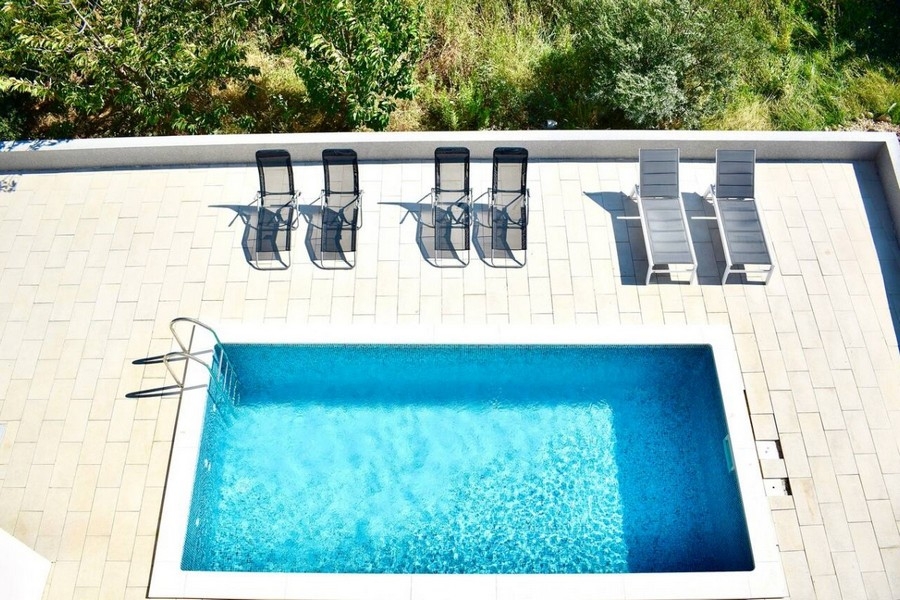 Bird's eye view of private pool with sun terrace