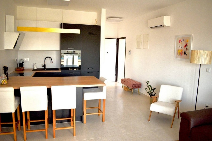 Modern kitchen with island and bar stools
