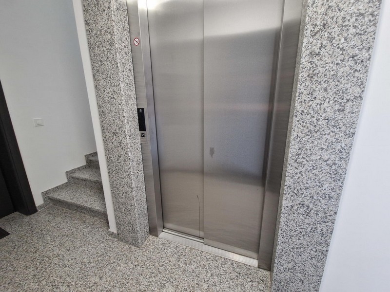 Elevator in the stairwell of a residential building