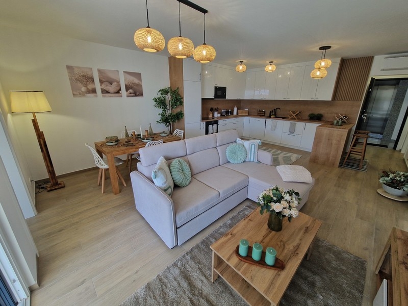 Bright living area with modern fitted kitchen