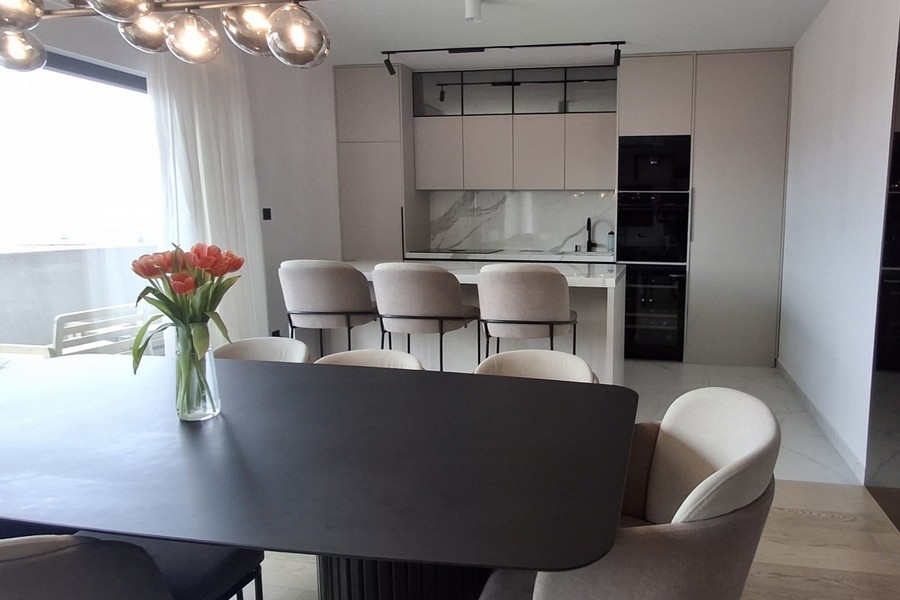 Modern kitchen with island and sea views
