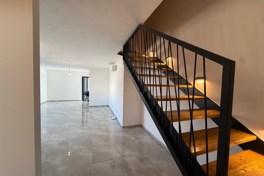 Modern staircase in maisonette apartment