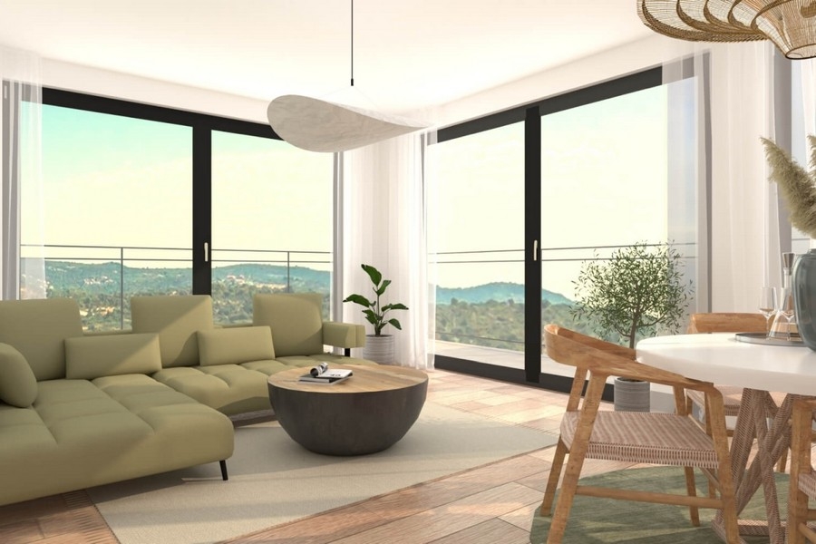 Bright living area with large windows and sea views