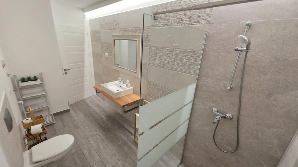 Bathroom with floor-level shower