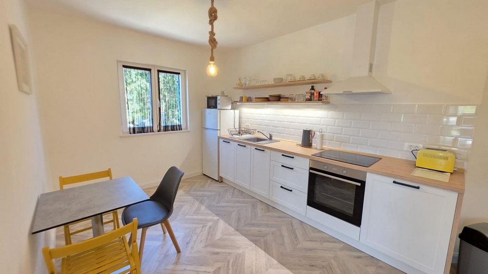 Modern kitchen with dining area