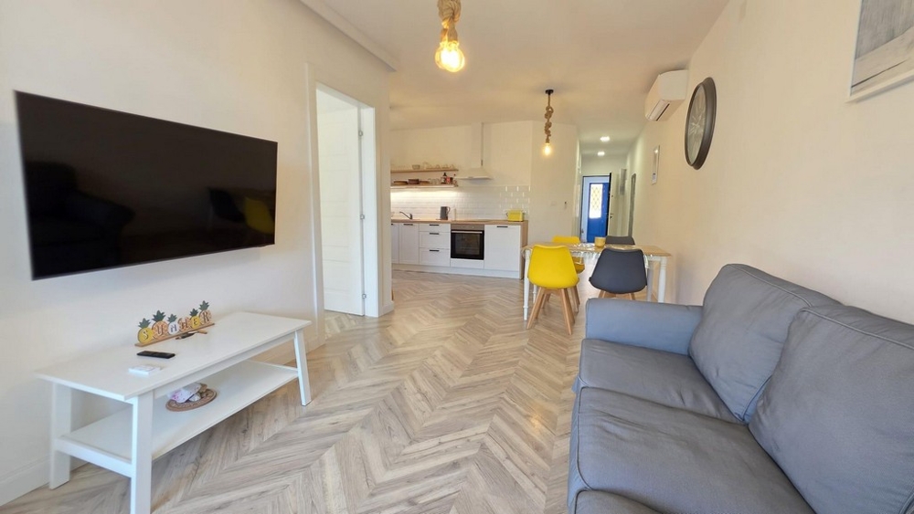 Bright living room with kitchen