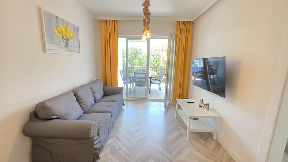 Living room with balcony access