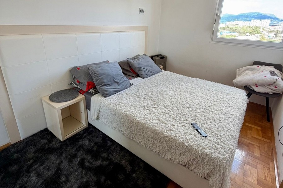 Bedroom with double bed and window view