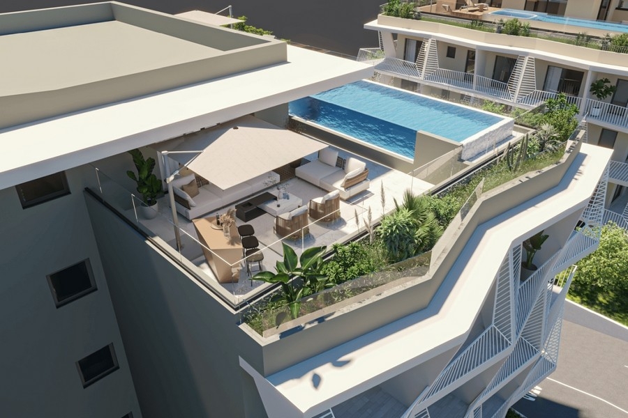 Modern roof terrace with pool and sea views