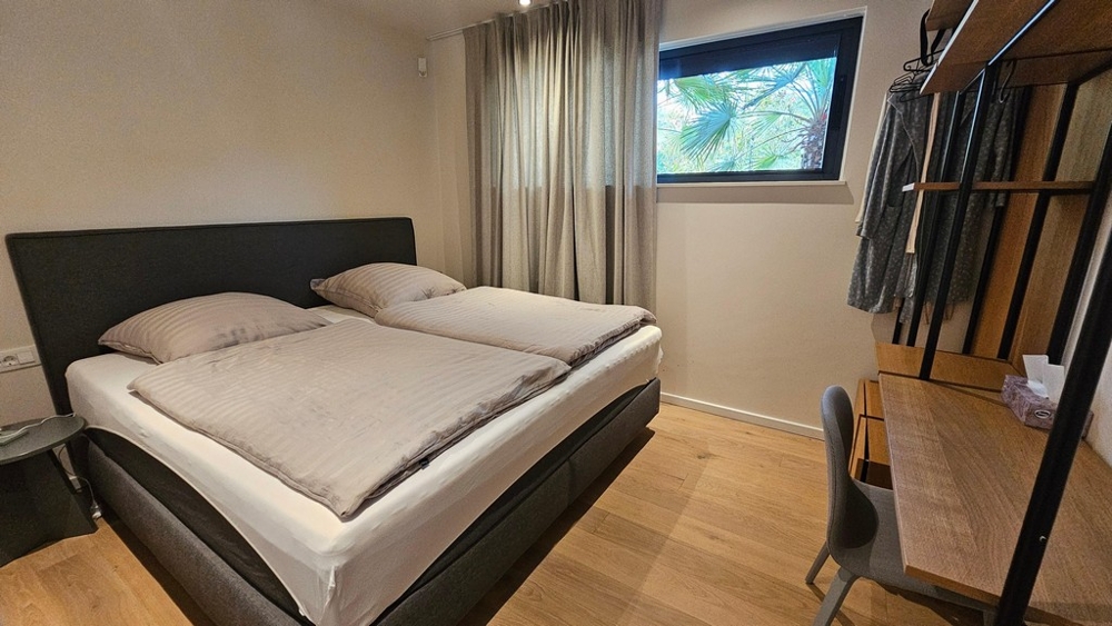 Bedroom with double bed and window