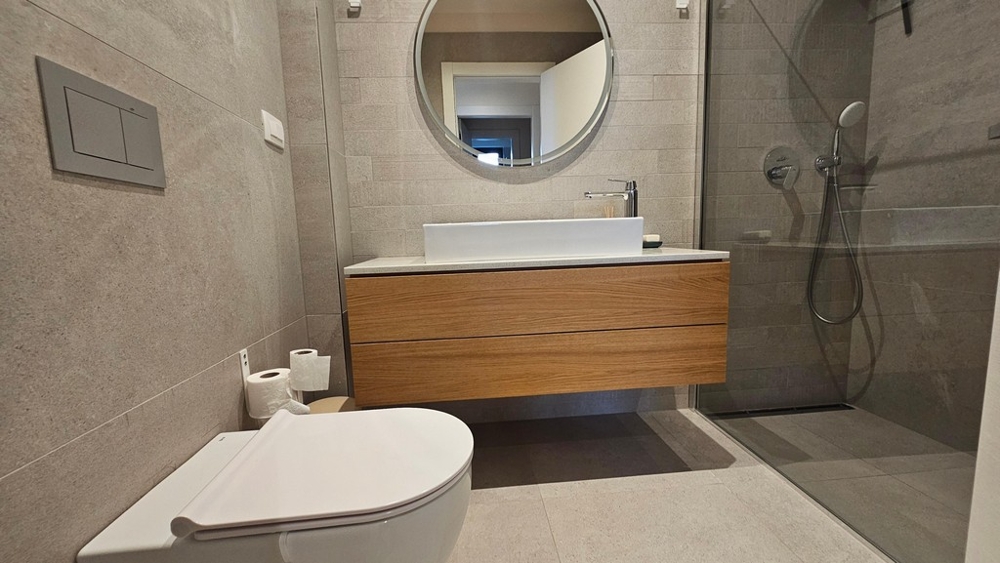 Modern bathroom with shower and vanity