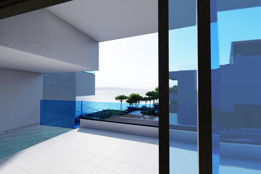 Terrace with glass railings and sea views