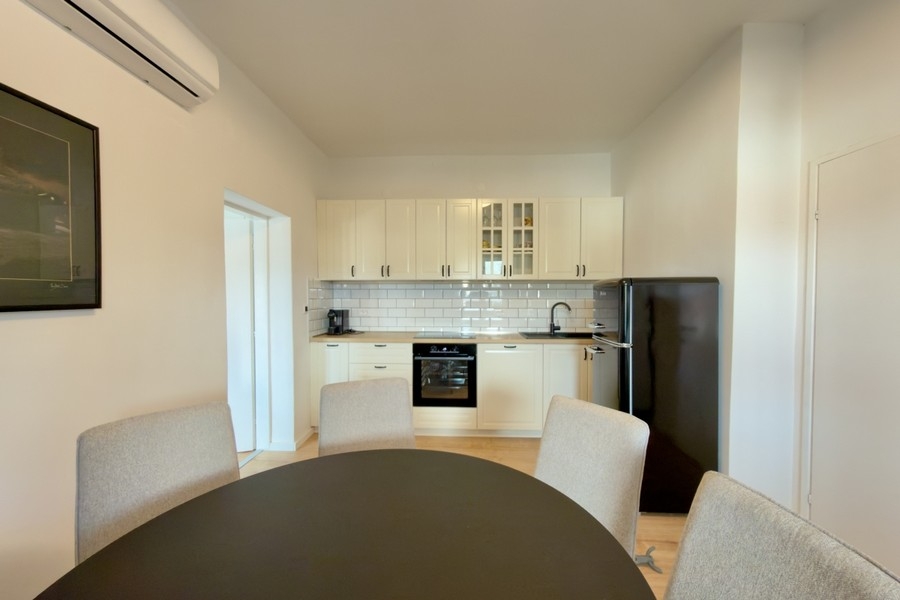 Open fitted kitchen with dining area