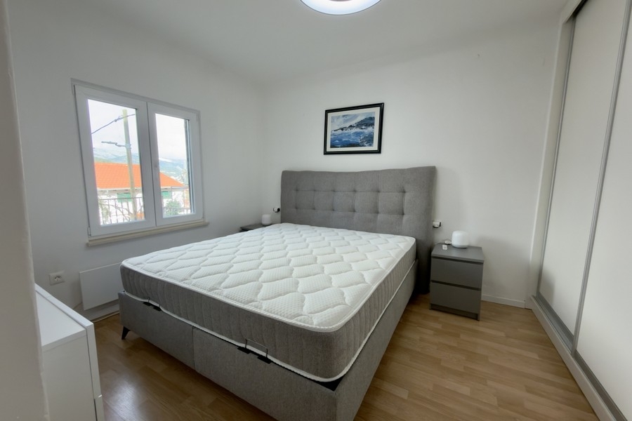 Bedroom with double bed and natural light