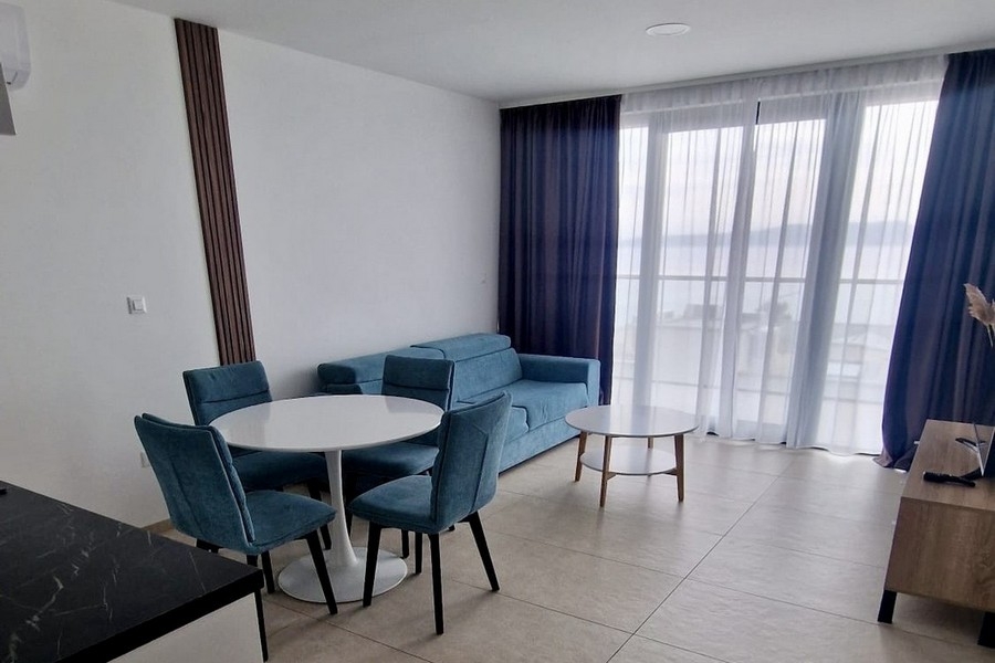 Living area with sofa and terrace access