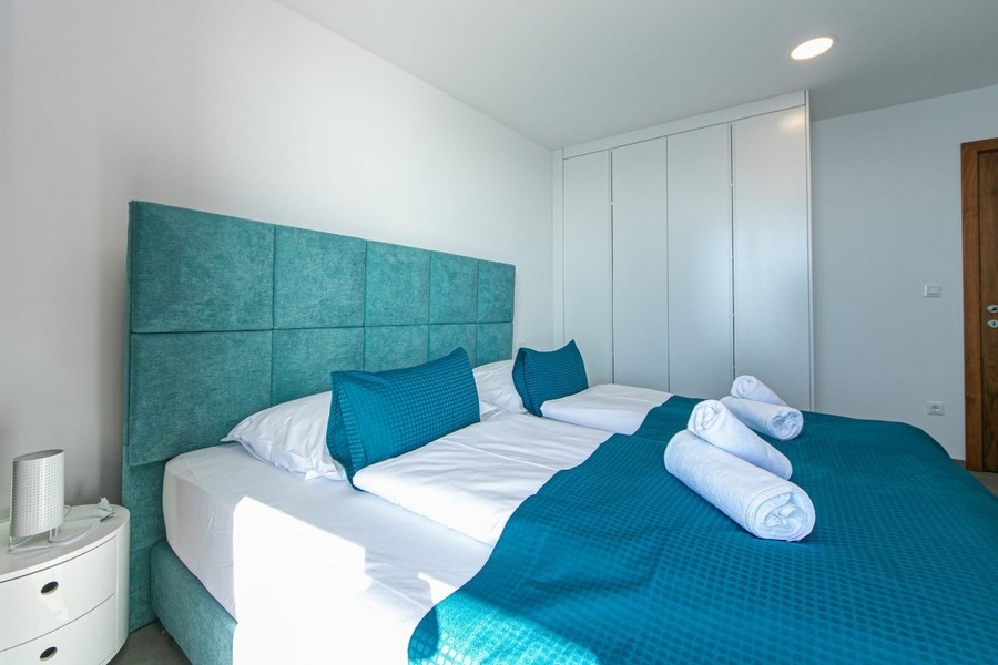 Bedroom with double bed and built-in wardrobe