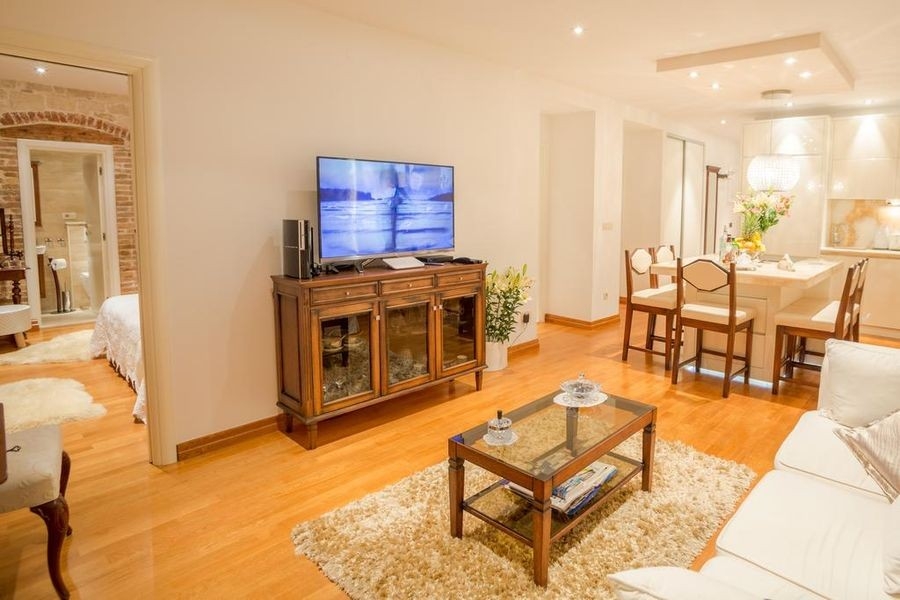 Living area with television and seating