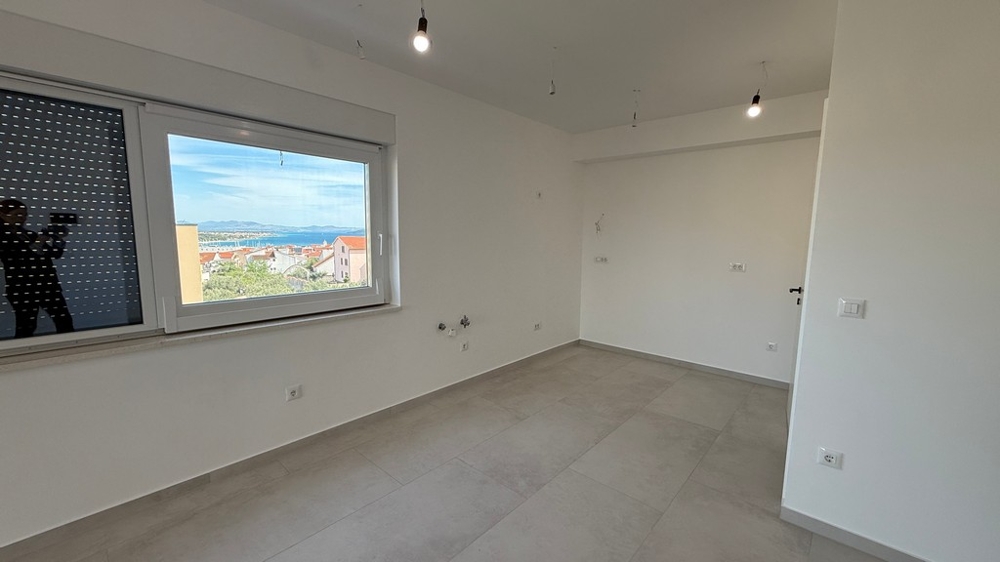 Room with window and sea view in Croatia