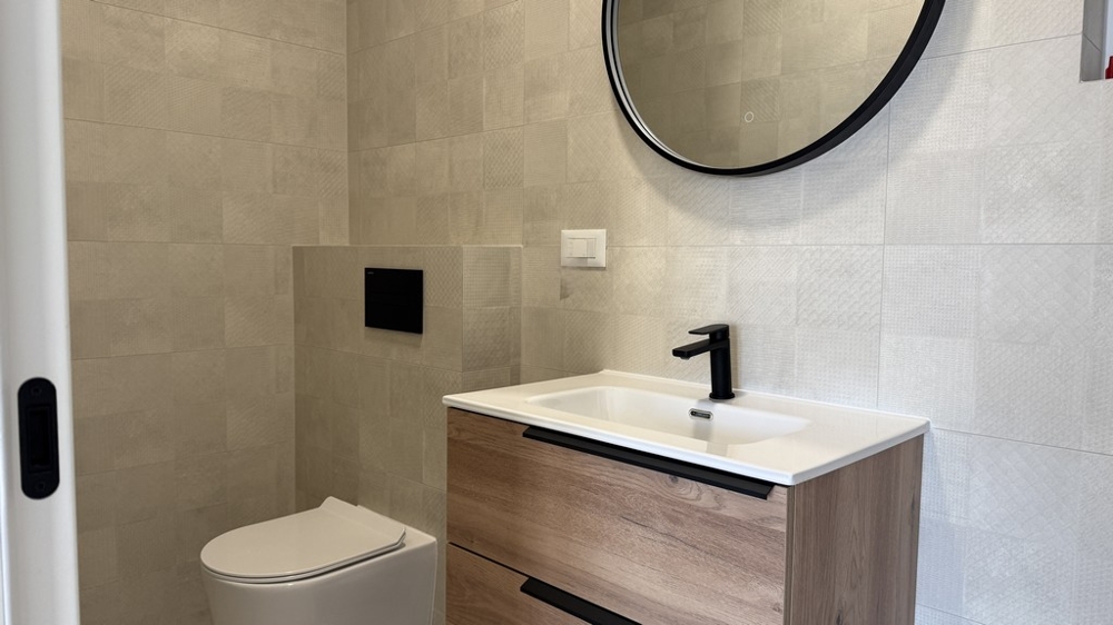 Modern bathroom with vanity and toilet
