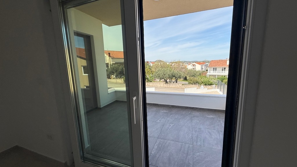 Living room with terrace access and sea views