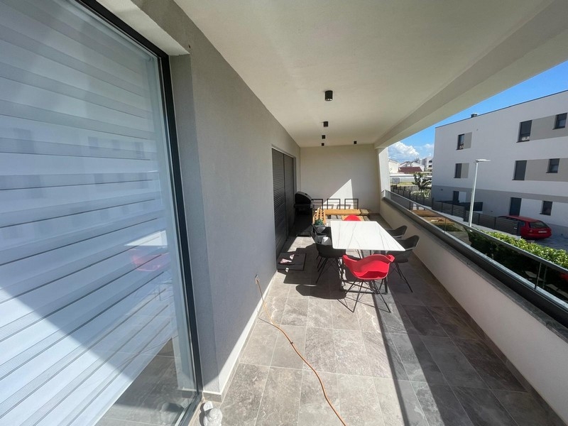 Covered terrace with seating area