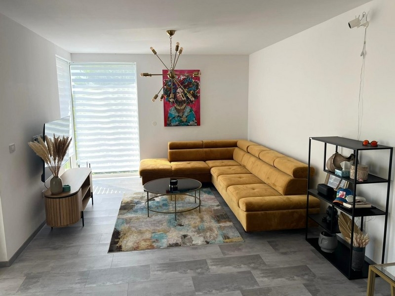 Bright living room with sofa