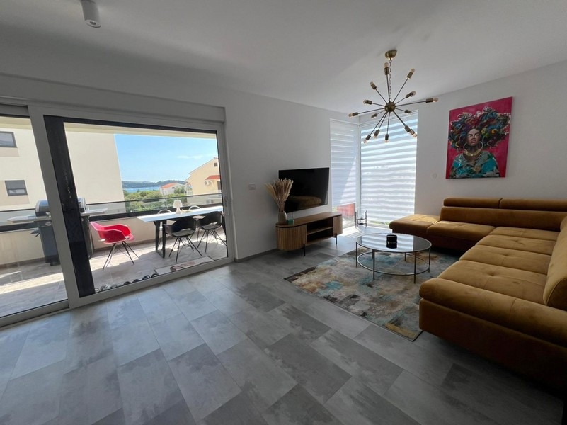 Living area with sofa and terrace access