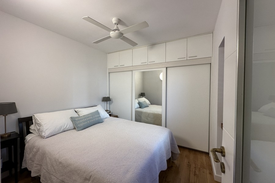 Bedroom with ceiling fan, Croatia