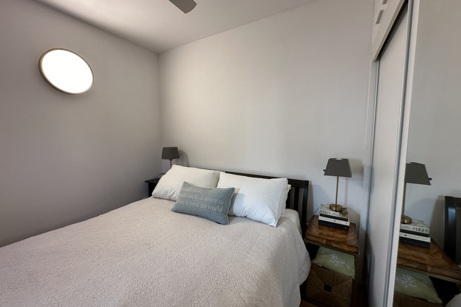 Bedroom with double bed and built-in wardrobe