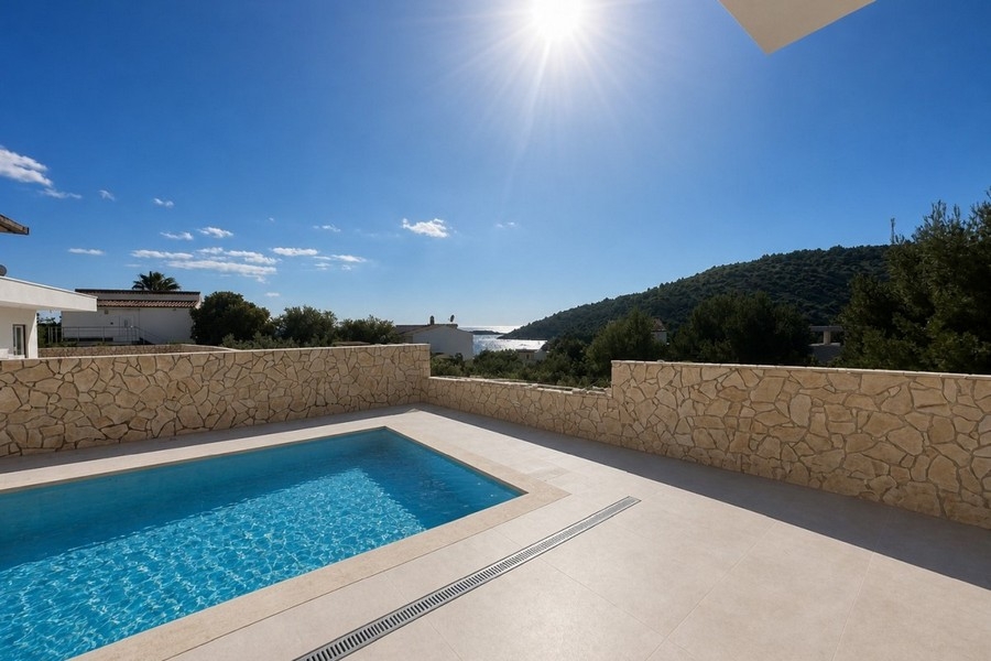 Swimming pool and terrace with sea views in Croatia