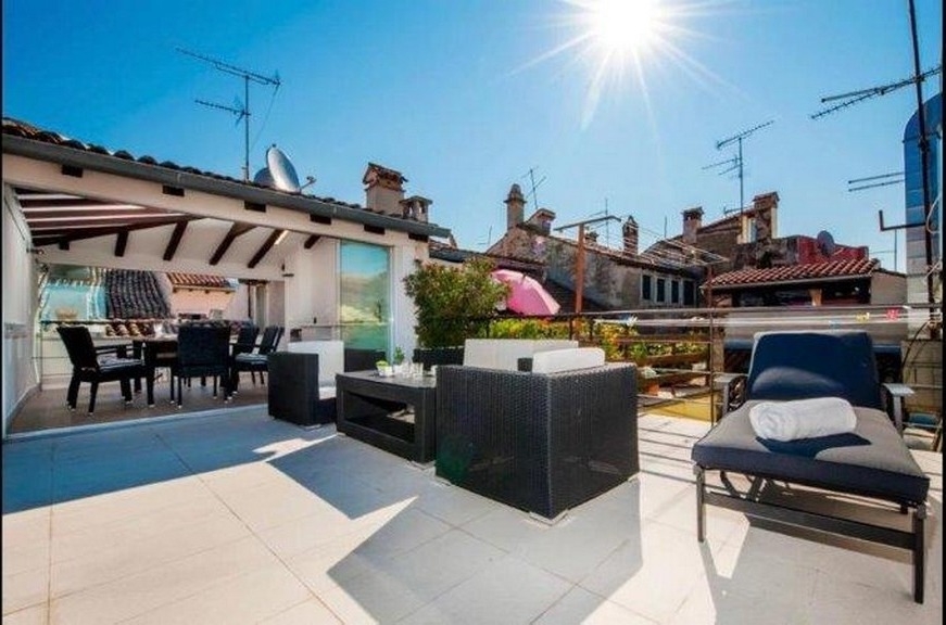 Roof terrace with a view over the old town of Rovinj
