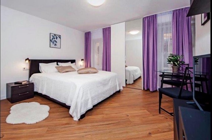 Bright bedroom with double bed