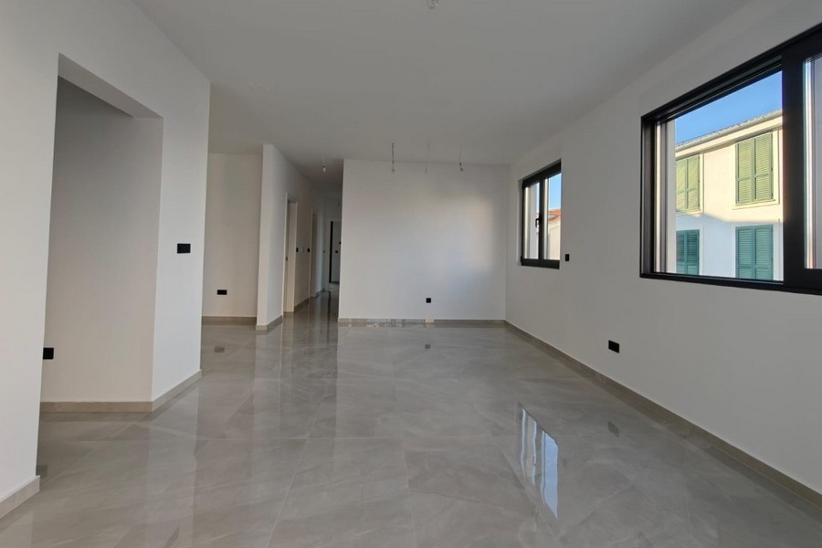 Open plan living space with floor tiles in Croatia