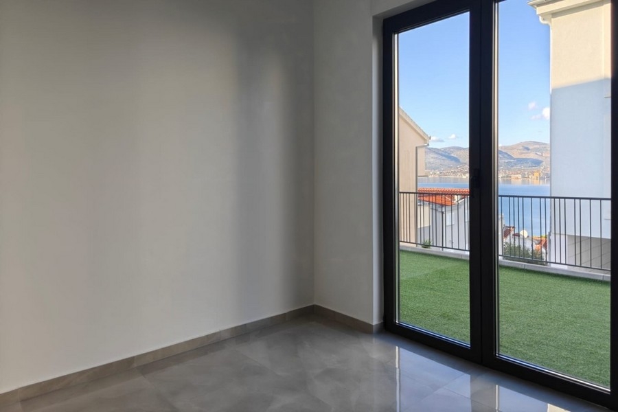 Room with windows and garden views