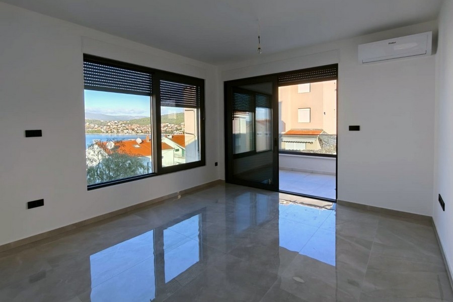 Living room with large windows and sea views