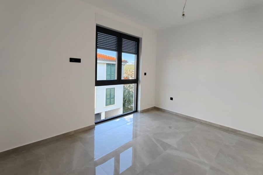 Light-flooded room with marble floors
