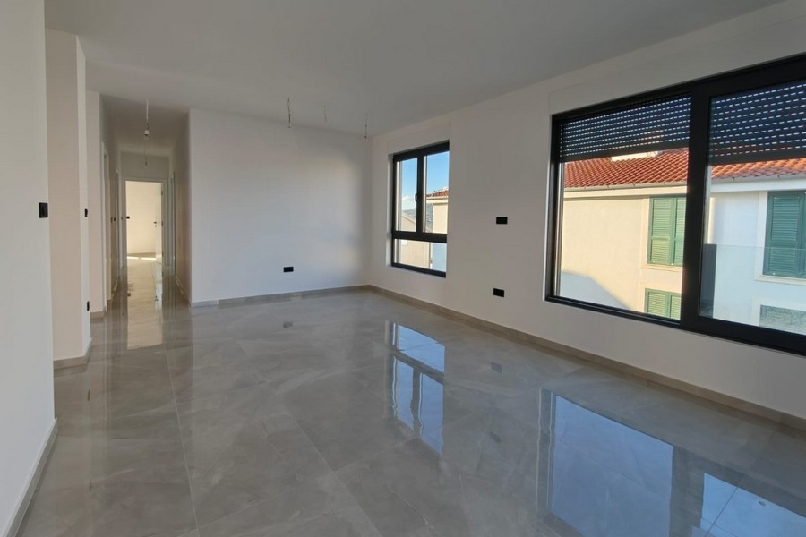 Spacious living room with hallway