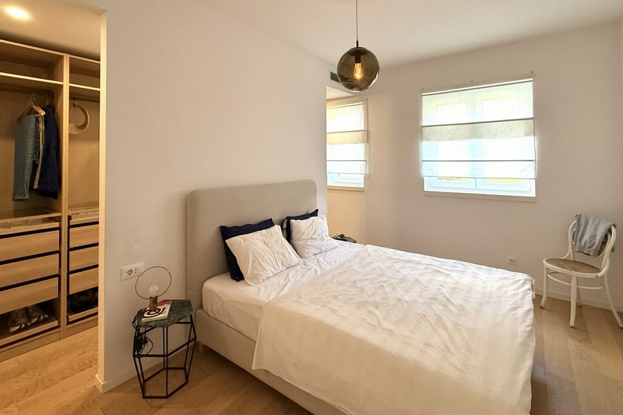Bedroom with walk-in closet