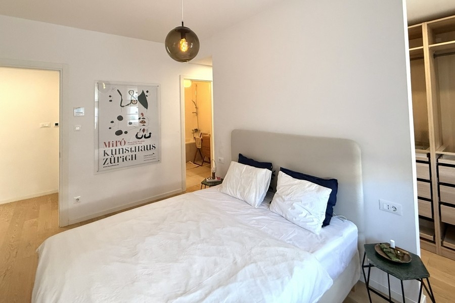 Bright bedroom with double bed