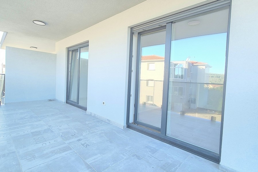 Bright living area with terrace access