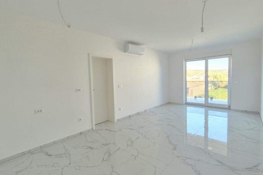 Living room with air conditioning and marble floors